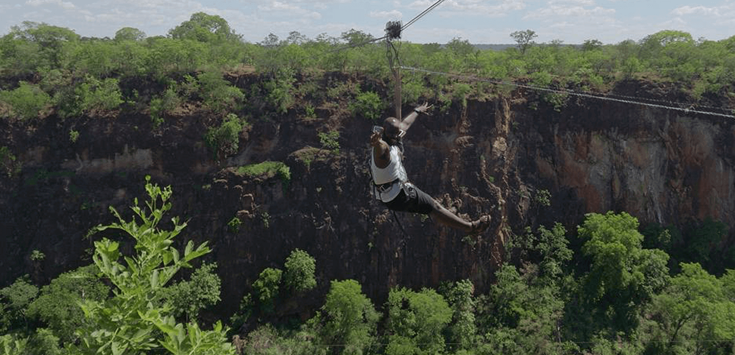 Striking a pose whilst dangling precariously between two towering gorges in livingstone, zambia, i bet its not only us who would be feeling giddy in the heat of such a moment
